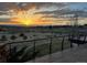 Breathtaking sunset view from the property, showcasing a serene landscape and a picturesque sky at 10177 Rancho Montecito Dr, Parker, CO 80138