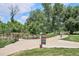 Scenic view of the tree-lined pathway and bridge perfect for walking and biking outdoors at 5250 S Huron Way # 5-308, Littleton, CO 80120
