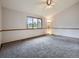 Spacious bedroom with carpet, vaulted ceilings and a large window that provides natural light at 9670 W 69Th Ave, Arvada, CO 80004