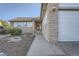 A welcoming entryway with a brick facade and a pathway leading to the front door at 9670 W 69Th Ave, Arvada, CO 80004