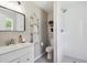 Bathroom features tile shower, modern fixtures, and tasteful decor at 13051 W Jewell Cir, Lakewood, CO 80228