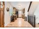 Kitchen with light wood cabinets, tile floors, and stainless steel appliances at 3720 S Hazel Ct, Englewood, CO 80110