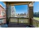 Balcony view showcasing the neighborhood with blue sky and mature trees at 658 Casper Dr, Lafayette, CO 80026