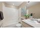 Cozy bathroom featuring a shower/tub combo and decorative artwork on the wall at 658 Casper Dr, Lafayette, CO 80026