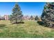 This community includes a grassy park area and playground, perfect for outdoor activities at 658 Casper Dr, Lafayette, CO 80026