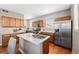 Functional kitchen with stainless steel appliances and ample counter space at 658 Casper Dr, Lafayette, CO 80026