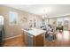 Open kitchen featuring stainless appliances and adjacent dining area at 658 Casper Dr, Lafayette, CO 80026