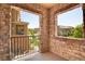 Scenic balcony view featuring brick archways overlooking a well-maintained community at 3437 Rosato Dr # C, Highlands Ranch, CO 80126