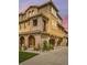 Beautiful exterior of a multi-story home with stone accents and a well-manicured lawn at 3437 Rosato Dr # C, Highlands Ranch, CO 80126