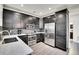 Stylish kitchen with stainless steel appliances and granite countertops at 3437 Rosato Dr # C, Highlands Ranch, CO 80126