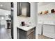 Convenient laundry room with modern washer and dryer, stylish countertop, and ample storage space at 3437 Rosato Dr # C, Highlands Ranch, CO 80126