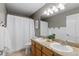 Cozy bathroom featuring dual sinks, neutral tones, and modern finishes at 18233 E Dorado Ave, Centennial, CO 80015