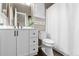 Bathroom features a white vanity, modern fixtures, and a shower with a curtain at 18233 E Dorado Ave, Centennial, CO 80015