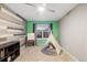 Bright, colorful bedroom with a teepee tent and a large window letting in natural light at 18233 E Dorado Ave, Centennial, CO 80015