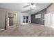 Spacious bedroom featuring a ceiling fan, gray accent wall, and plush carpet at 18233 E Dorado Ave, Centennial, CO 80015