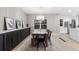 Elegant dining room featuring contemporary chandelier and ample space for entertaining guests at 18233 E Dorado Ave, Centennial, CO 80015