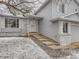 Charming two-story home with light blue siding, a well-manicured lawn, and a welcoming entrance at 3833 S Bahama St, Aurora, CO 80013