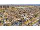 Stunning aerial view showcasing a neighborhood with mature trees and a scenic pond, providing a serene and picturesque environment at 438 S Emerson St, Denver, CO 80209