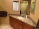 Bathroom featuring granite countertops, a single sink, and great lighting at 540 S Forest St # A2, Denver, CO 80246