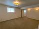 Carpeted bedroom with natural light, overhead lighting, and sconces at 540 S Forest St # A2, Denver, CO 80246