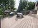 Wooden deck with patio furniture and grill at 540 S Forest St # A2, Denver, CO 80246