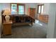 Carpeted main bedroom features natural light from sliding doors and a large window at 540 S Forest St # A2, Denver, CO 80246