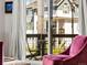 Cozy balcony setting with iron chairs and table, offering a relaxing outdoor space with views at 6162 W 28Th Ct, Edgewater, CO 80214