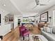 Bright open-concept living space seamlessly connecting kitchen, dining, and living areas at 6162 W 28Th Ct, Edgewater, CO 80214