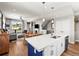 Spacious living area with an open floorplan to the kitchen and access to the outdoor patio at 6162 W 28Th Ct, Edgewater, CO 80214