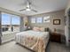 Serene bedroom featuring ample natural light and plush bedding for a peaceful retreat at 6162 W 28Th Ct, Edgewater, CO 80214