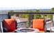 Inviting rooftop with comfortable seating around a modern fire pit and stunning mountain views at 6162 W 28Th Ct, Edgewater, CO 80214