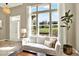 Bright living room with large windows and comfortable seating, perfect for relaxation at 3720 Pecos Trl, Castle Rock, CO 80109