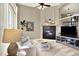 Elegant living room features a cozy fireplace and neutral decor for a relaxing ambiance at 3720 Pecos Trl, Castle Rock, CO 80109