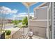 A view of the neighborhood street from the balcony showcasing the beautiful scenery at 5571 Killarney St, Denver, CO 80249