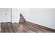 Finished basement with wood floors and access to upstairs at 5571 Killarney St, Denver, CO 80249
