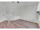 Spacious bedroom with hardwood floors, bright natural light, and neutral walls, ready for personalization at 5571 Killarney St, Denver, CO 80249