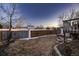 A large backyard provides a canvas for landscaping and recreation behind a privacy fence at 2697 S Deframe Cir, Lakewood, CO 80228