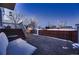 Private backyard with a deck and wooden fence at 2697 S Deframe Cir, Lakewood, CO 80228