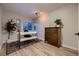 Bright home office with a desk and built-in shelving at 2697 S Deframe Cir, Lakewood, CO 80228