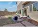 Charming backyard patio with stylish furniture, creating an inviting outdoor space for relaxing and entertaining guests at 17838 E 54 Th Ave, Denver, CO 80249