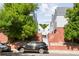 Front view of townhouses with landscaping and parking at 1035 Jasmine St # 3, Denver, CO 80220