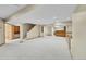 Finished basement with carpeted floors and bar area, perfect for entertaining at 2316 Weatherstone Cir, Highlands Ranch, CO 80126