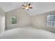 Spacious bedroom with vaulted ceiling, ceiling fan, and bright windows at 2316 Weatherstone Cir, Highlands Ranch, CO 80126