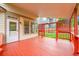 Spacious outdoor deck with a covered area, perfect for relaxing and entertaining guests at 2316 Weatherstone Cir, Highlands Ranch, CO 80126