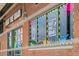 Building exterior with colorful 'Beat the Bomb' signage and brick facade at 3055 N York St, Denver, CO 80205