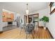 Dining area connecting to the kitchen and living room, perfect for entertaining at 3055 N York St, Denver, CO 80205