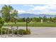 Golf course with tree, bike rack, and mountain views at 3055 N York St, Denver, CO 80205