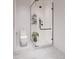 Contemporary bathroom with a walk-in shower and white tile at 4305 46Th Ave # 1, Denver, CO 80212