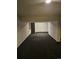 Unfinished basement with dark gray carpeting at 84 S Carlton St, Castle Rock, CO 80104