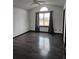 Spacious bedroom featuring dark hardwood floors and a large window at 84 S Carlton St, Castle Rock, CO 80104